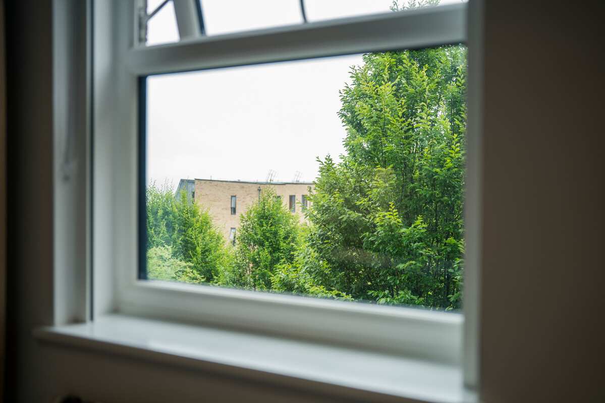 a view of the trees and other accommodation buildings from a glamorgan court room
