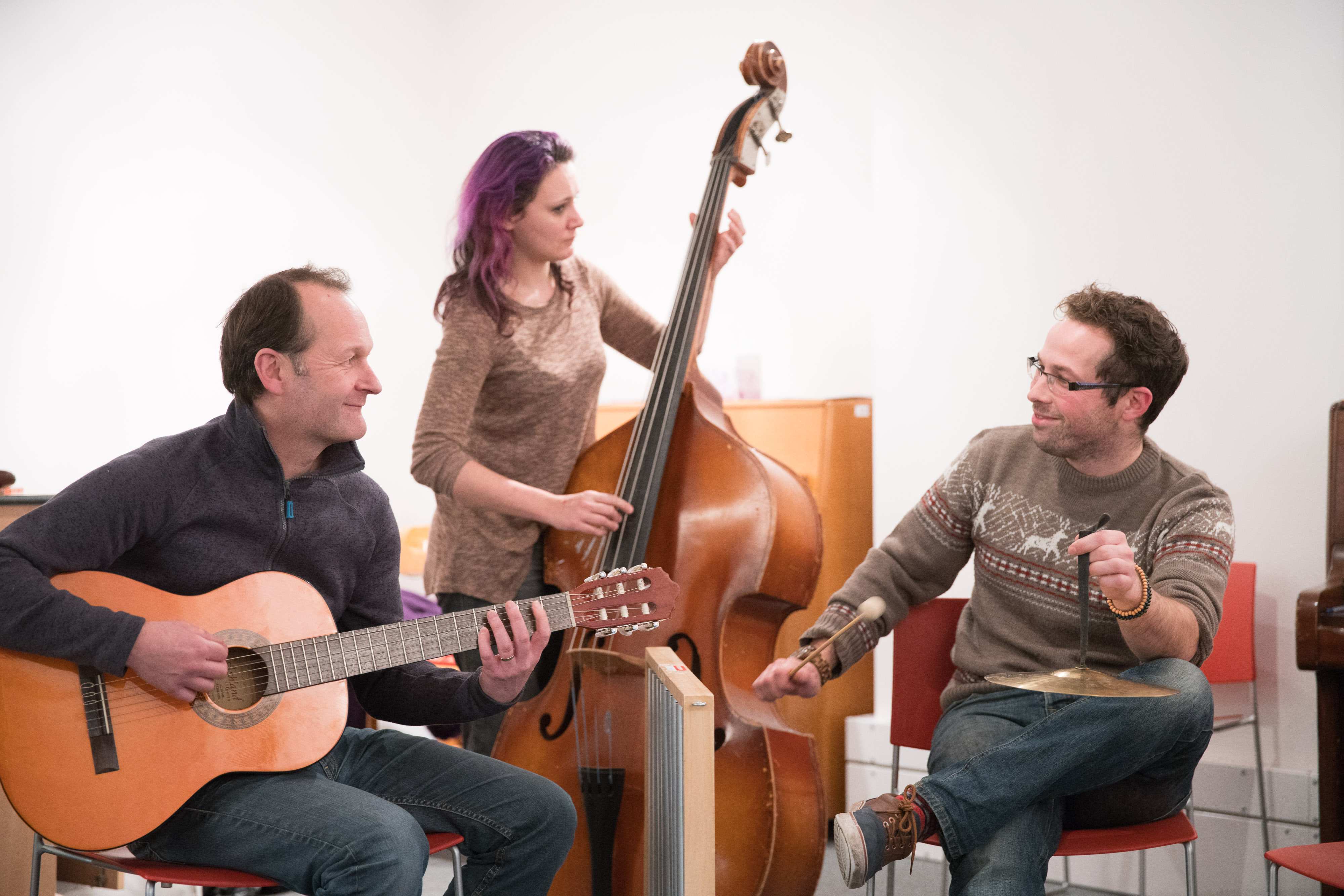 A group of students playing instruments together.