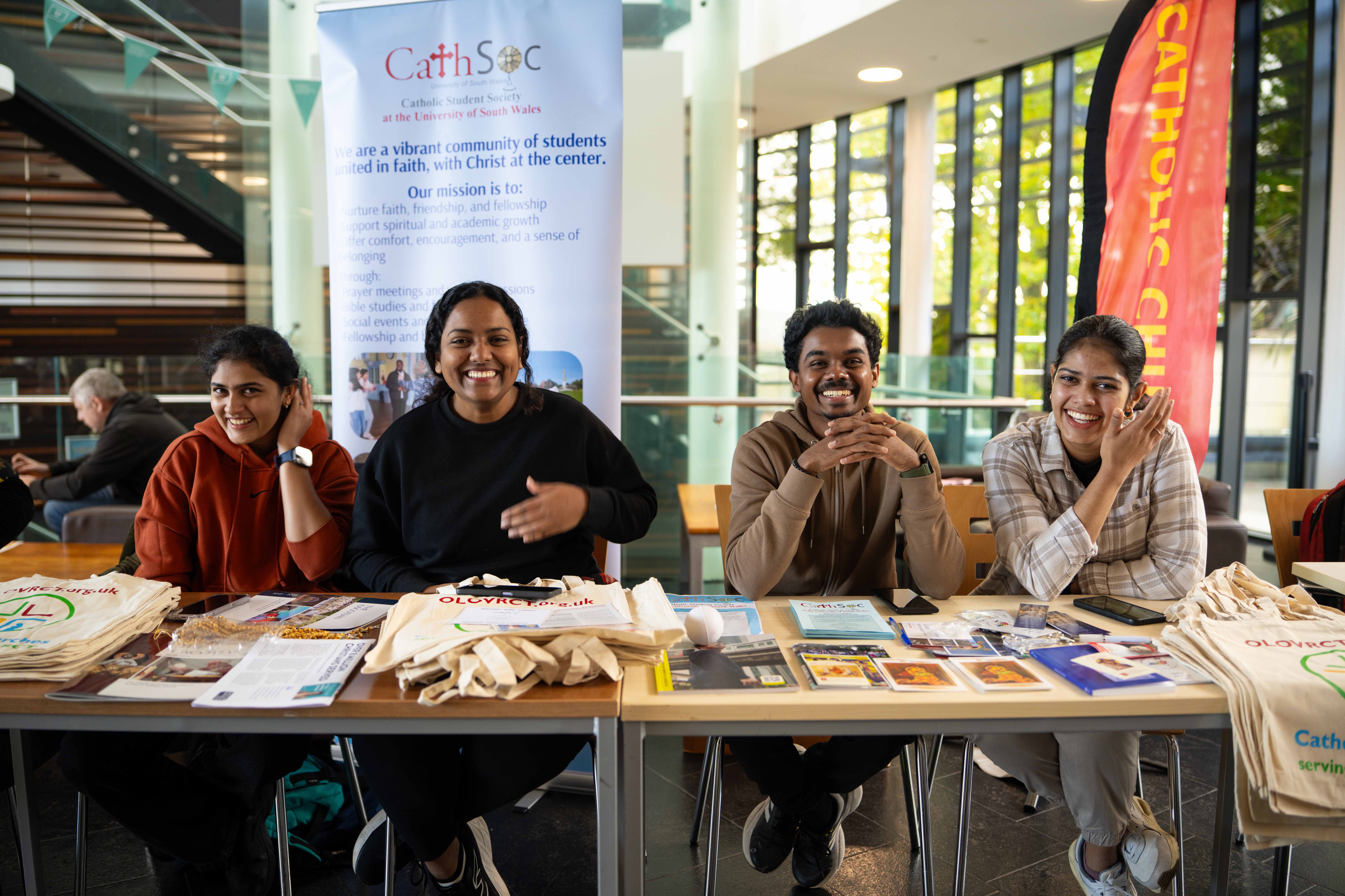 Members of the USW Christian Society sat at their stall at an Open Day.