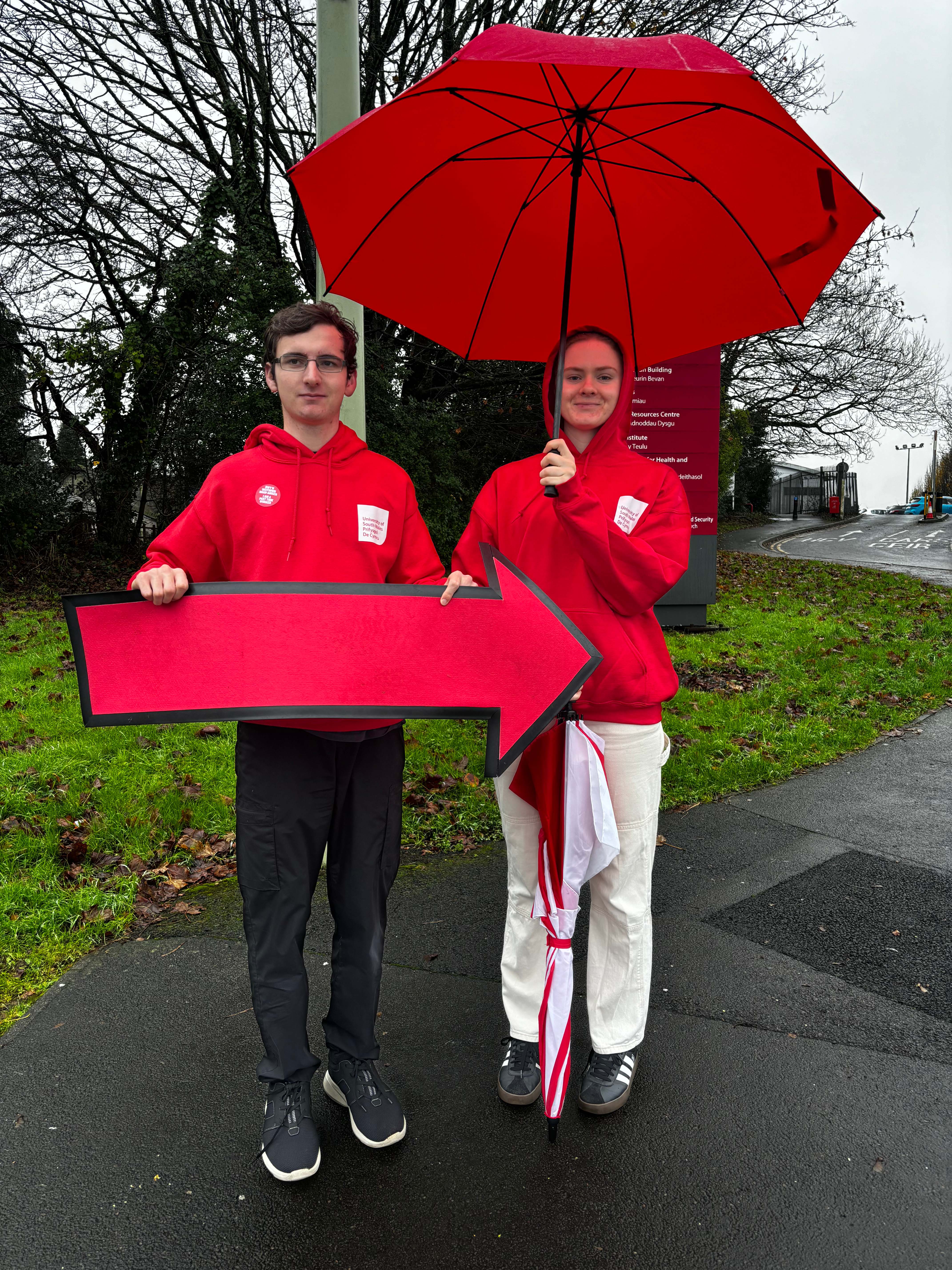 Student ambassador, Jade, and a fellow ambassador working at an Open Day.