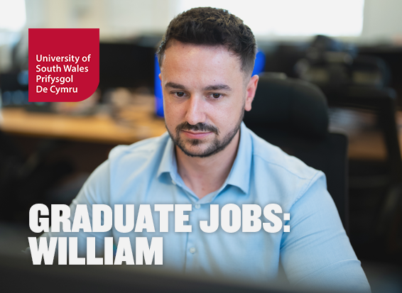 Digital Forensics Graduate William concentrates while sat at a computer in a USW computing laboratory