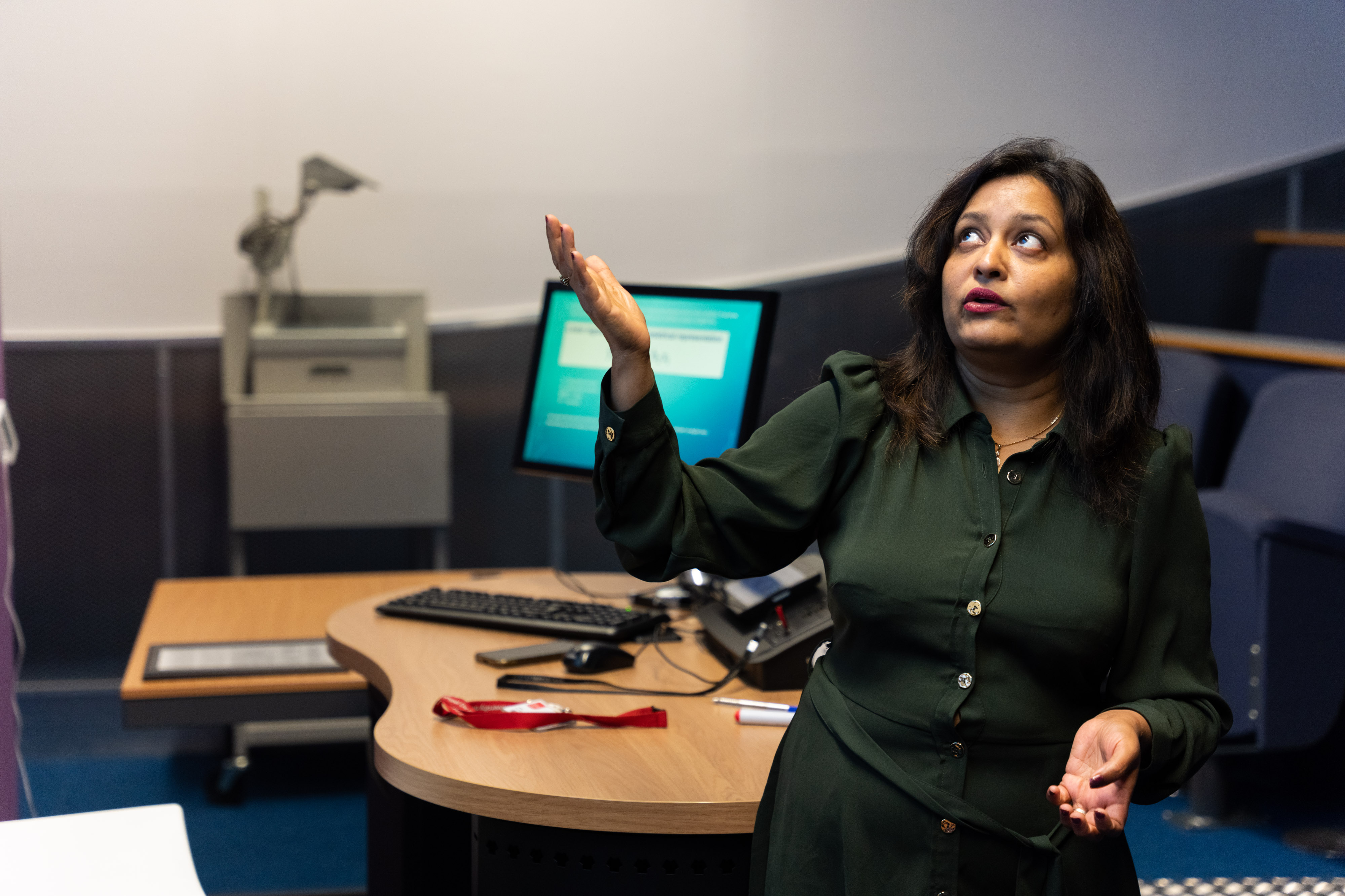 A lecturer teaching in a classroom