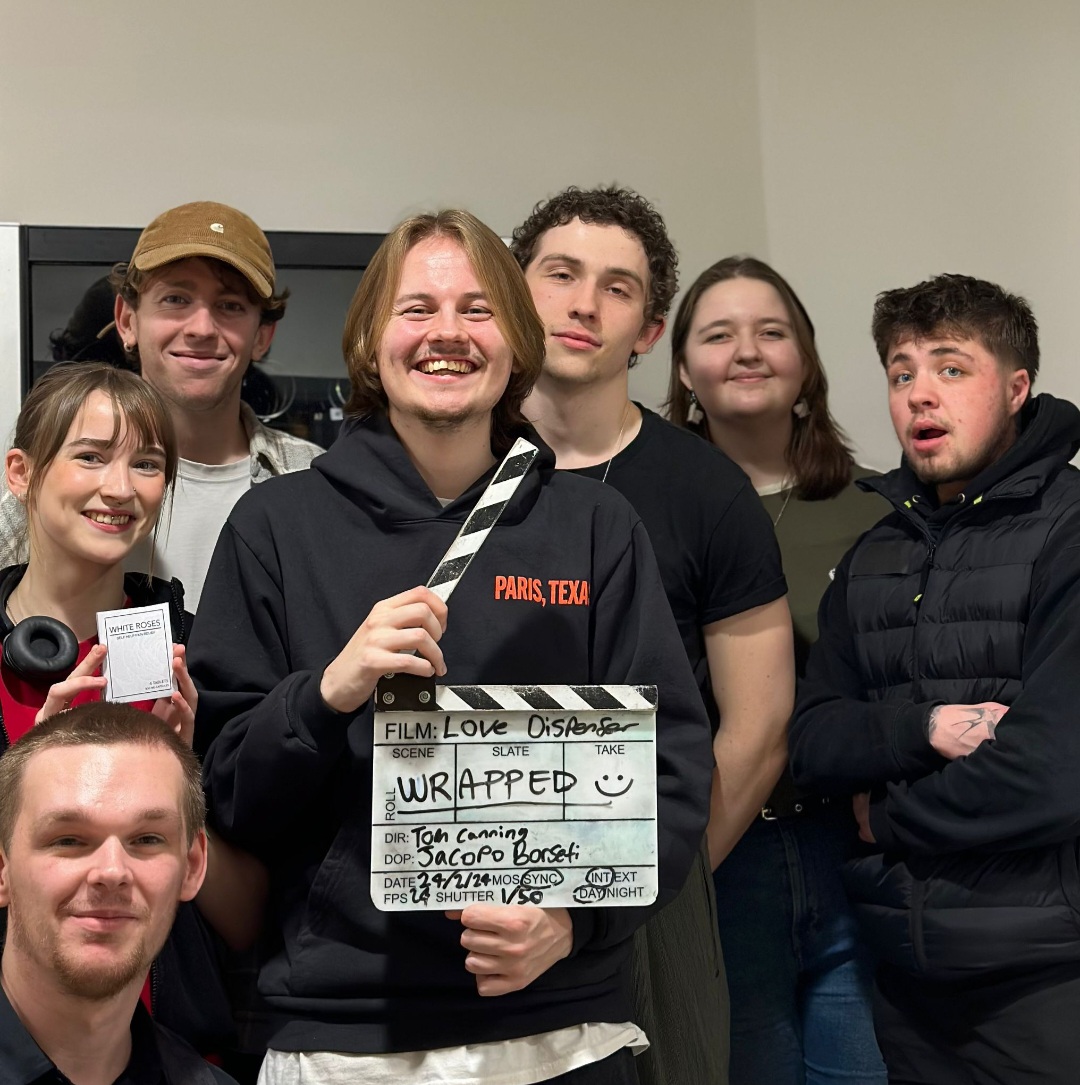 A group of students working as crew for a short film