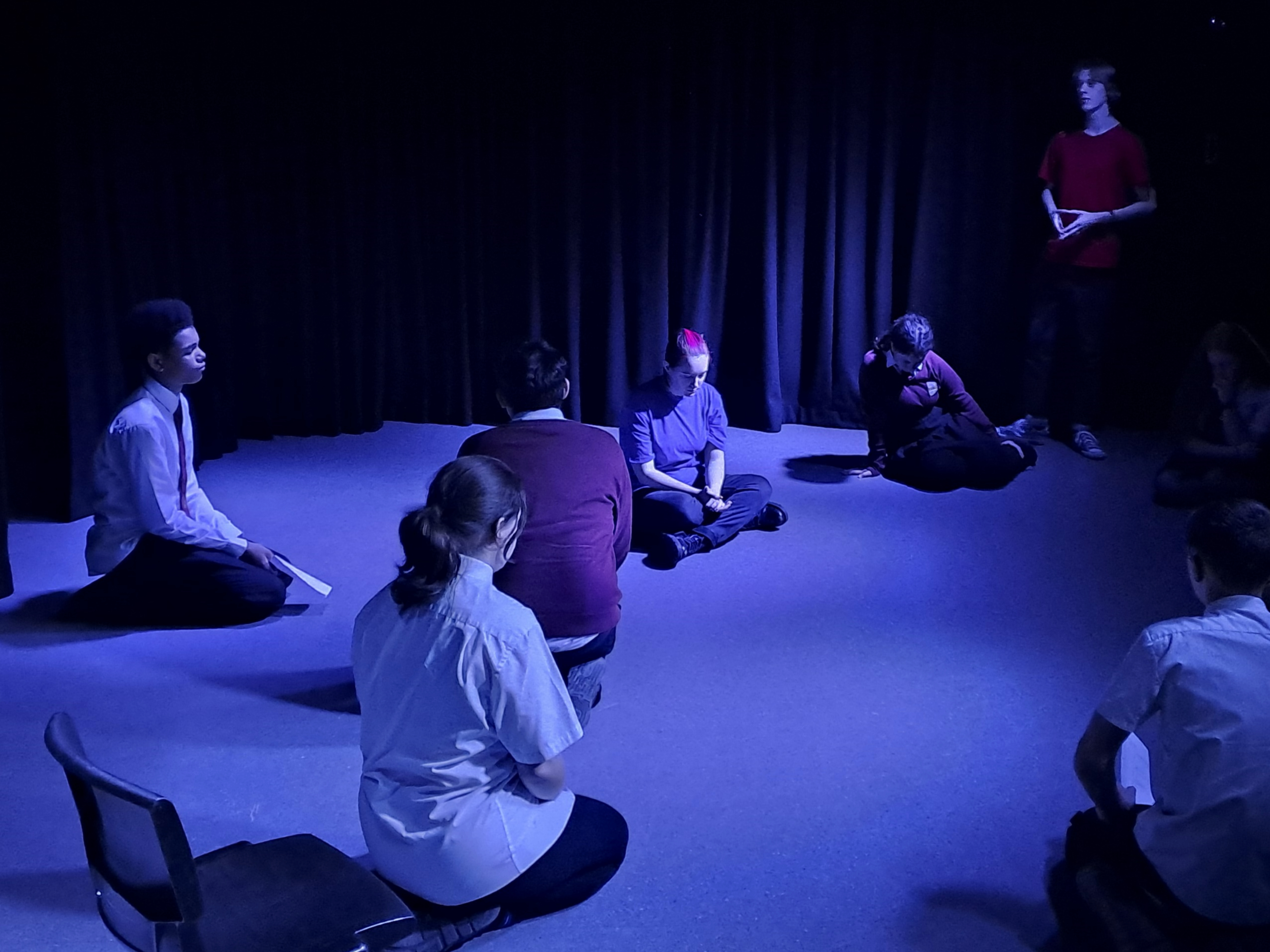 drama and performance students in a drama studio