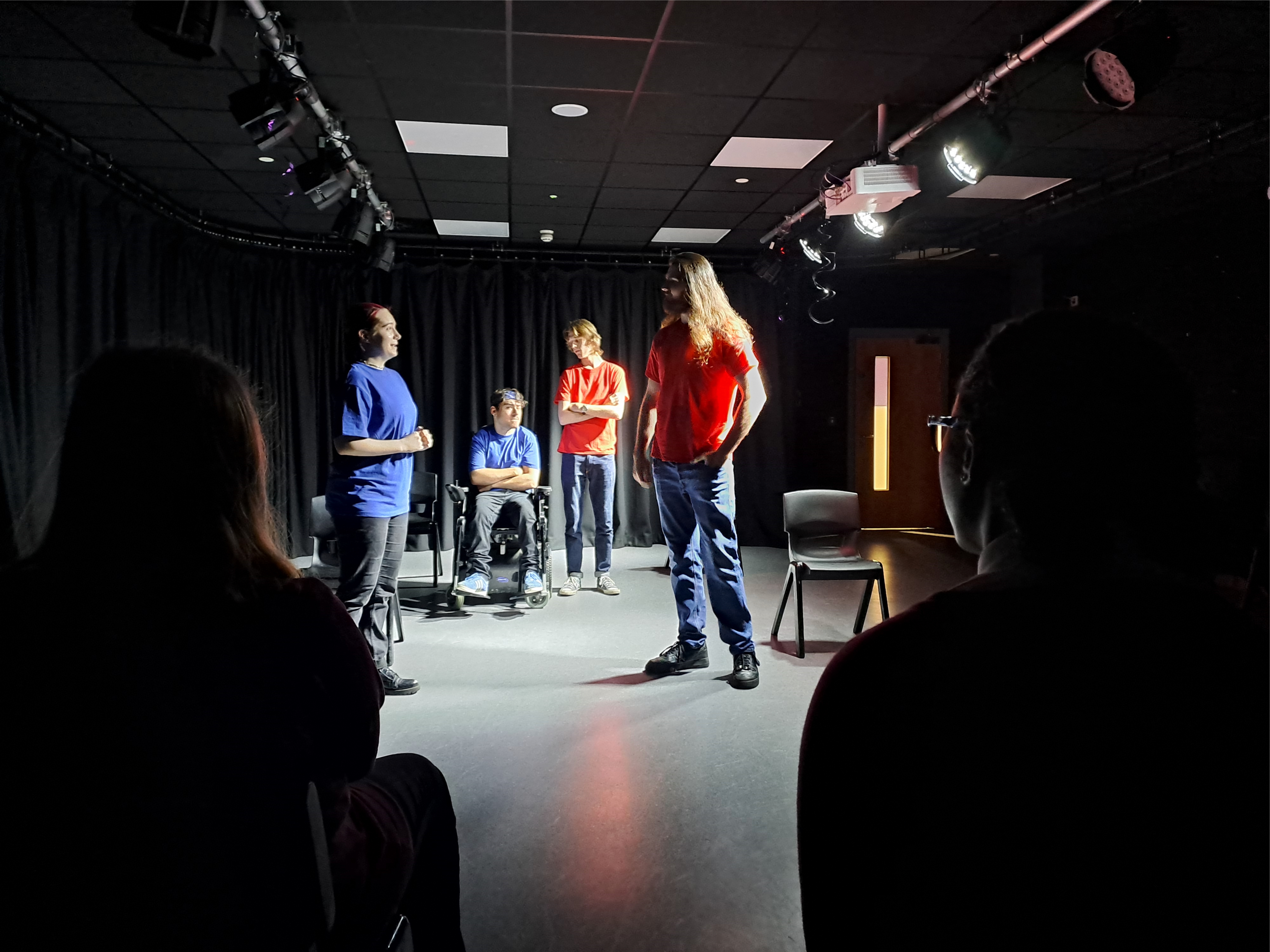 drama and performance students in a drama studio