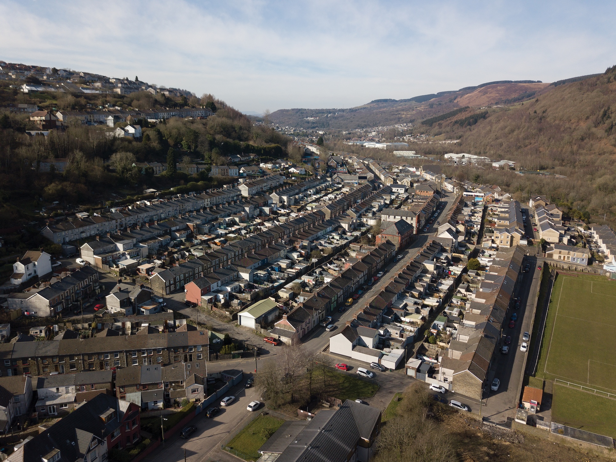 An arial view of a Welsh valley town on a hillside