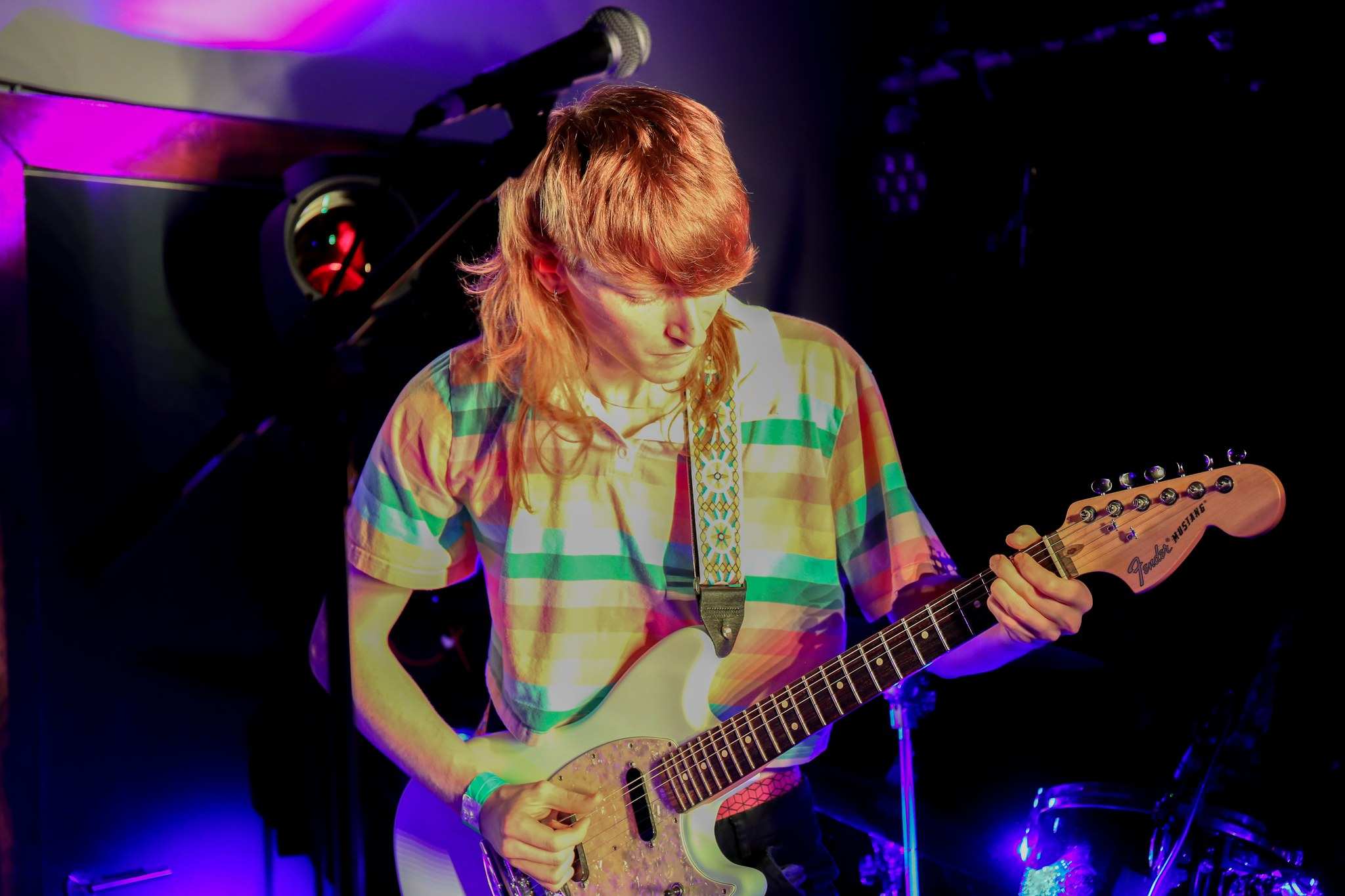 music student playing a guitar