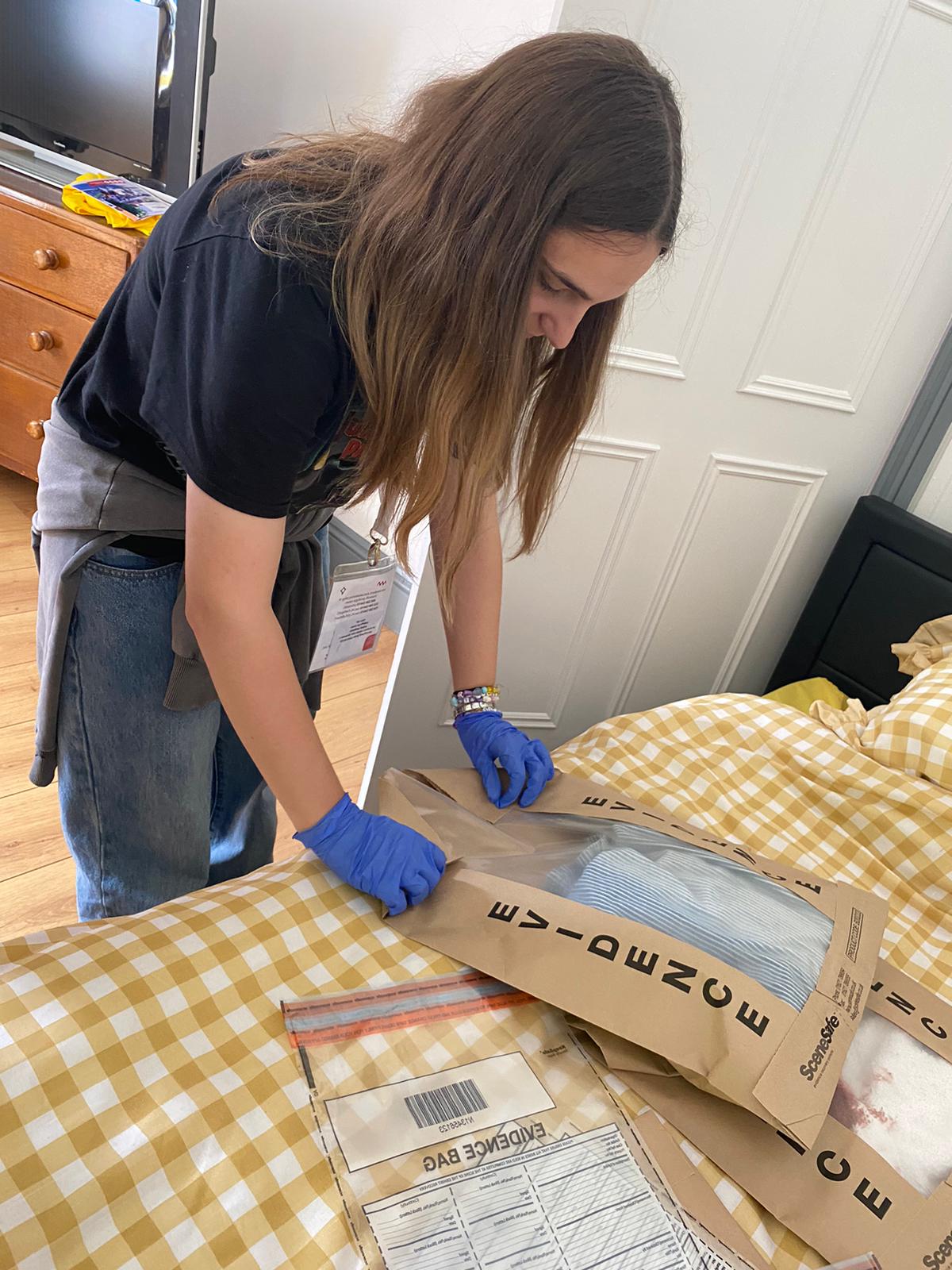 pupil packing an evidence bag
